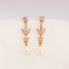 Rose gold pearl earrings